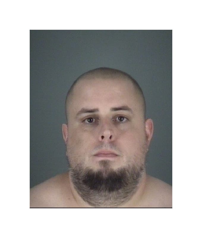 Ryan Samuel Defrancisco is accused of threatening a motorcyclist who ran a red light. 