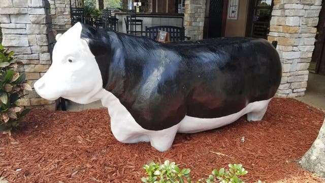 Police are asking for the public's help to recover a cow mascot that sat in from of Harold Seltzer's Steakhouse.