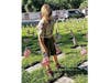 Members of Cub Scout Pack 431 plant flags on the graves of fallen soldiers. 