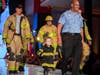 Trinity D’Autorio strolls the runway with and Ron Sayegh and other members of Tampa Fire Rescue's Engine 9.