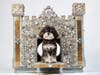 This jewel-encrusted dog house was created by Eileen Goldenberg.