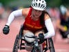 Lance Cpl. Annika Hutsler places first in the wheelchair race...