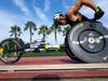 Army Sgt. Jonathan Weasner races a wheelchair during the Warrior Games in Tampa Saturday.