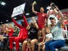 Family and friends cheer on the athletes. 