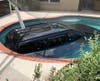 A Dodge Nitro plunged into an unsuspecting resident's backyard pool. 