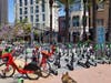 San Diego resident Karen Millhouse says hundreds of e-scooters now clog the streets of her city. 