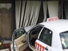 No one was injured but ​employees were shaken up when an accident resulted in two cars crashing into an office building.