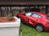 No one was injured but ​employees were shaken up when an accident resulted in two cars crashing into an office building.