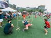Residents enjoy limbo and other games at Sparkman Wharf in Channelside. 