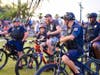 A toddler is treated to a ride with the Tampa Police bicycle patrol. 
