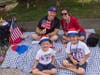 A patriotic family enjoys the Temple Terrace Fourth of July parade. 