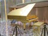 Elvis-Presley-s-24k gold leaf grand piano is on permanent display in the grand entrance way. 