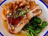 Double-cut pork chops with apple cider glaze, broccoli rabe, crispy fingerlings and smoked paprika aioli.