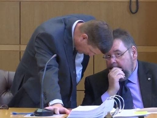 Michael Drejka confers with his defense attorney, John Trevena. 