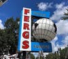 A crane was used to lower the iconic sign into place. 