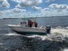 The Coast Guard assisted five people on a vessel taking on water near the Skyway Bridge Sunday afternoon. 