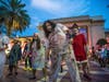 Ghouls and zombies gathered to perform the epic Michael Jackson "Thriller" dance. 