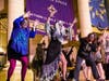 Ghouls and zombies gathered to perform the epic Michael Jackson "Thriller" dance. 