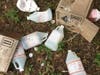 Among the debris were two boxes marked "corrosive," which contained nine 1-gallon containers of muriatic acid. 