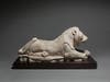This limestone lion couchant is 6th-century Archaic Greek. 