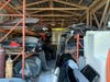 A Riverview couple has been arrested after 12 stolen vehicles and dozens of car parts were found during a search of their home.