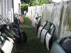 A Riverview couple has been arrested after 12 stolen vehicles and dozens of car parts were found during a search of their home.