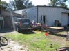 A Riverview couple has been arrested after 12 stolen vehicles and dozens of car parts were found during a search of their home.