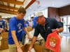 Jesuit students will make and deliver a drive-record 280 abundant Thanksgiving meals to local families in need.