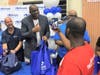 Basketball legend Ervin "Magic" Johnson was in Tampa to help distribute 400 Thanksgiving turkeys to needy families.