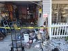 Cleanup is underway by the Palm Harbor Fire Rescue Department after a 95-year-old woman plowed into the garage of a Palm Harbor home.