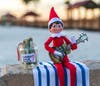Elf performs for candy cane money. 