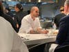 Elevated kitchen counter dining promotes a foodie culture.