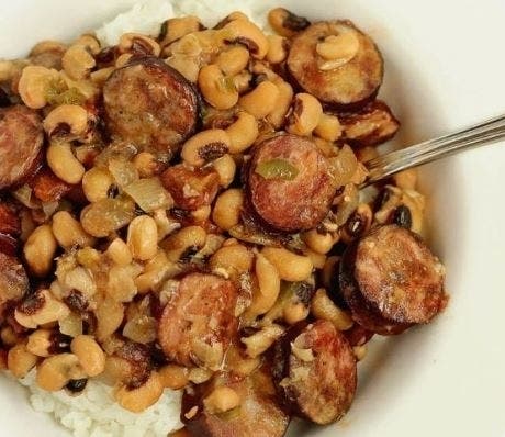 In the South, eating Hoppin' John (black-eyed peas and rice) on New Year's Day is thought to bring a prosperous year filled with luck. 