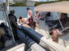 Coast Guard investigating officers along with Florida Fish and Wildlife Conservation Commission halt a 22-foot uninspected passenger vessel for hire with six passengers March 7 near Naples.
