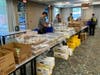 Firefighters Charities of Pasco County​ and the Rotary Club of Wesley Chapel​ put food and supplies together for stay-at-home elderly residents.