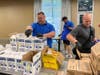 Firefighters Charities of Pasco County​ and the Rotary Club of Wesley Chapel​ put food and supplies together for stay-at-home elderly residents.