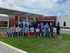 The community posted signs of support at AdventHealth Connerton and Wesley Chapel.