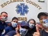 Trish Krider made more than 200 masks for her son's EMS unit in Escambia County. 