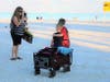 A family celebrates the reopening of Clearwater Beach.