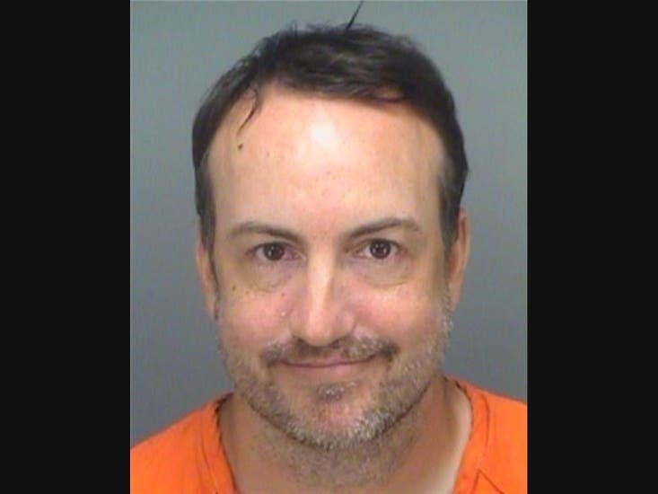 Thomas John Kovack, 40, has been charged with 10 count of video voyeurism.