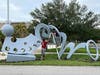 The city of Dunedin's unforgettable Bounce sculpture is brighter and more colorful following the completion of its restoration. 