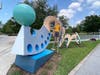 The city of Dunedin's unforgettable Bounce sculpture is brighter and more colorful following the completion of its restoration. 