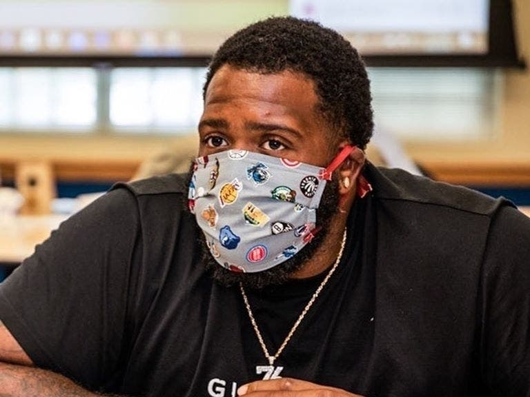 Tampa Bay Bucs offensive tackle Donovan Smith sports an NFL logo mask at a recent event.