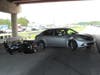 A Florida Highway Patrol motorcycle trooper narrowly escaped serious injury after a car lost control and veered toward him.