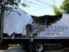 An out-of-control delivery truck crashed into a traffic light pole just before 7 a.m. Wednesday, knocking out the power supply for the signal.