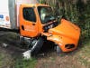 An out-of-control delivery truck crashed into a traffic light pole just before 7 a.m. Wednesday, knocking out the power supply for the signal.