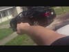 Body cam footage shows a Tampa Police officer drawing his gun before officers approached the stolen car. 