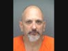 Charles Dana Combs has been charged with armed robbery.