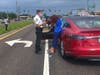 Deputies give Linda Norris a field sobriety test. 