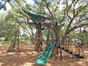 The playground also features two separate play areas including swings, slides and other climbers. 